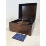 A Garrard automatic record changer. Model R.C.65 with manual. W:43cm x D:36cm x H:29cm
