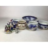 A blue and white part dressing table set together with three flat back figurines