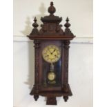A Vienna style wall clock. W:31cm x D:19cm x H:80cm