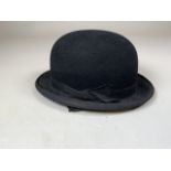 A vintage bowler hat by Tress and Co London.