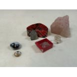 A collection of mineral samples to include uncut diamonds, rose quartz