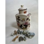 A lidded masons jar also with a collection of Wade animals and others.H:19cm