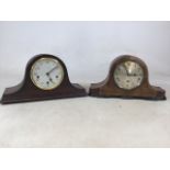 Two mid century wooden mantle clocks. H:23cm