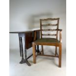 A Sutherland table with turned legs and stretcher, ceramic castors also with a ladder back dining