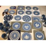 A large collection of Wedgwood commemorative Christmas Jasper ware plates and tankards together with