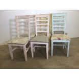 A set of six pine painted ladder back chairs. W:45cm x D:44cm x H:103cm