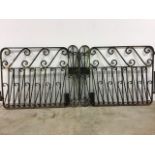 A pair of Victorian wrought iron gates and a metal fire mantleW:237cm x D:2.5cm x H:92cm