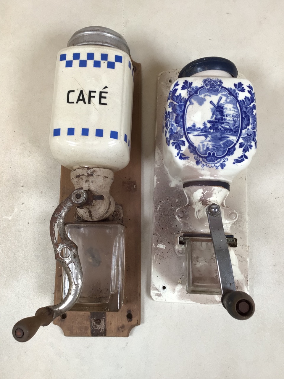 Two wall mounted ceramic coffee grinders with glass wells. W:12cm x D:12cm x H:40cm