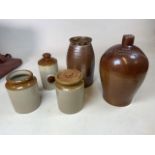 Five stoneware items to include a two gallon flagon for BullThorne and Smith, Nuneaton and jars