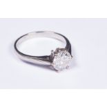 An unmarked platinum and diamond single stone ring. central brilliant cut diamond approximately 1.