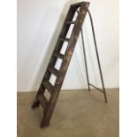 A pair of metal step ladders.H:157cm