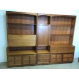 A Nathan three piece wall display unit. Can be split into three units. W:257cm x D:45cm x H:193cm