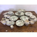 A large collection of Johnson Bros Indian tree dinner ware.