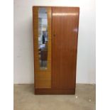 A mid century wardrobe with dressing mirror. W:89cm x D:49cm x H:180cm