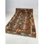 A Maimana Kilim rug. W:78cm x H:140cm.