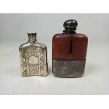 Two early 20th century white metal hip flasks