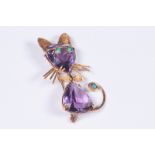 A French 1970s 18ct gold amethyst and turquoise cat brooch. 9.6g 5cm.
