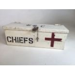 A vintage metal medical box with contents. Painted with initials ERC - Chiefs. Padlock and key in