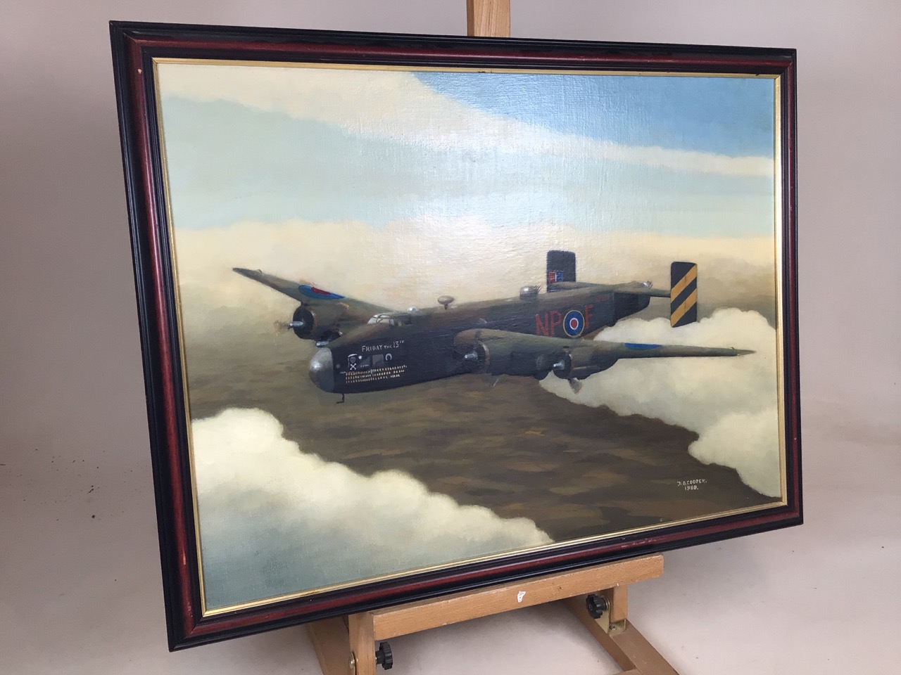 An oil on board of a WW1 bomber by. D.N COOPER 1988. Friday the 13th. Together with a similar