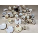 A large collection of Coronation ware including mugs, plates and dishes