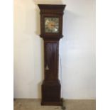 A late 19th century mahogany long case clock silvered chapter and gilt face with gilt spandrels