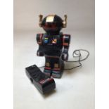A Talk-A-Troon Robot in working order. H:29cm