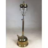 A brass Tilley lamp with original glass shade. Marked TILLEY LAMP CO HENDON ENGLAND. H:60cm