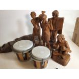 African style figures, bongo drums and a wooden tribal mask