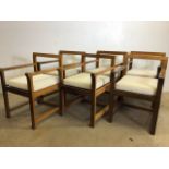 A set of six hardwood Margaret Muir carver arm chairs with cushions. Seat height H:44cm