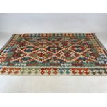A Choli Kilim rug. W:100cm x H:147cm