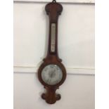 A mahogany banjo barometer. H:92cm