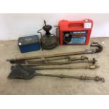 Heavy brass fire irons and a shooting stick metal burners also with a set of snow chains.