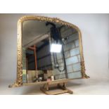 An early 20th century gilt over mantle mirror with ornate leaf decoration. W:125cm x H:97cm