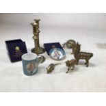 A collection of brass animals and a pair of brass candlesticks together with two boxes Royal