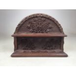 A highly detailed delicately carved pipe rack. W:31cm x D:8cm x H:24cm