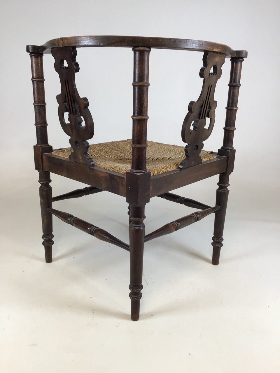 A 19th century rattan seated corner chair with curved back and lyre supports. W:61cm x D:61cm x H: - Image 3 of 6