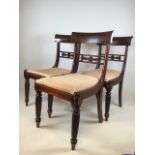 Three Victorian mahogany bar back dining chairs with reeded legs. Seat height H:44cm