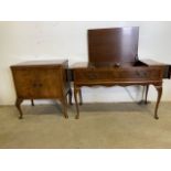 A walnut veneered Garrard radio gram with pull out speakers also with a record cabinet and a