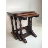 An oak nest of three tables. W:49cm x D:33cm x H:48cm