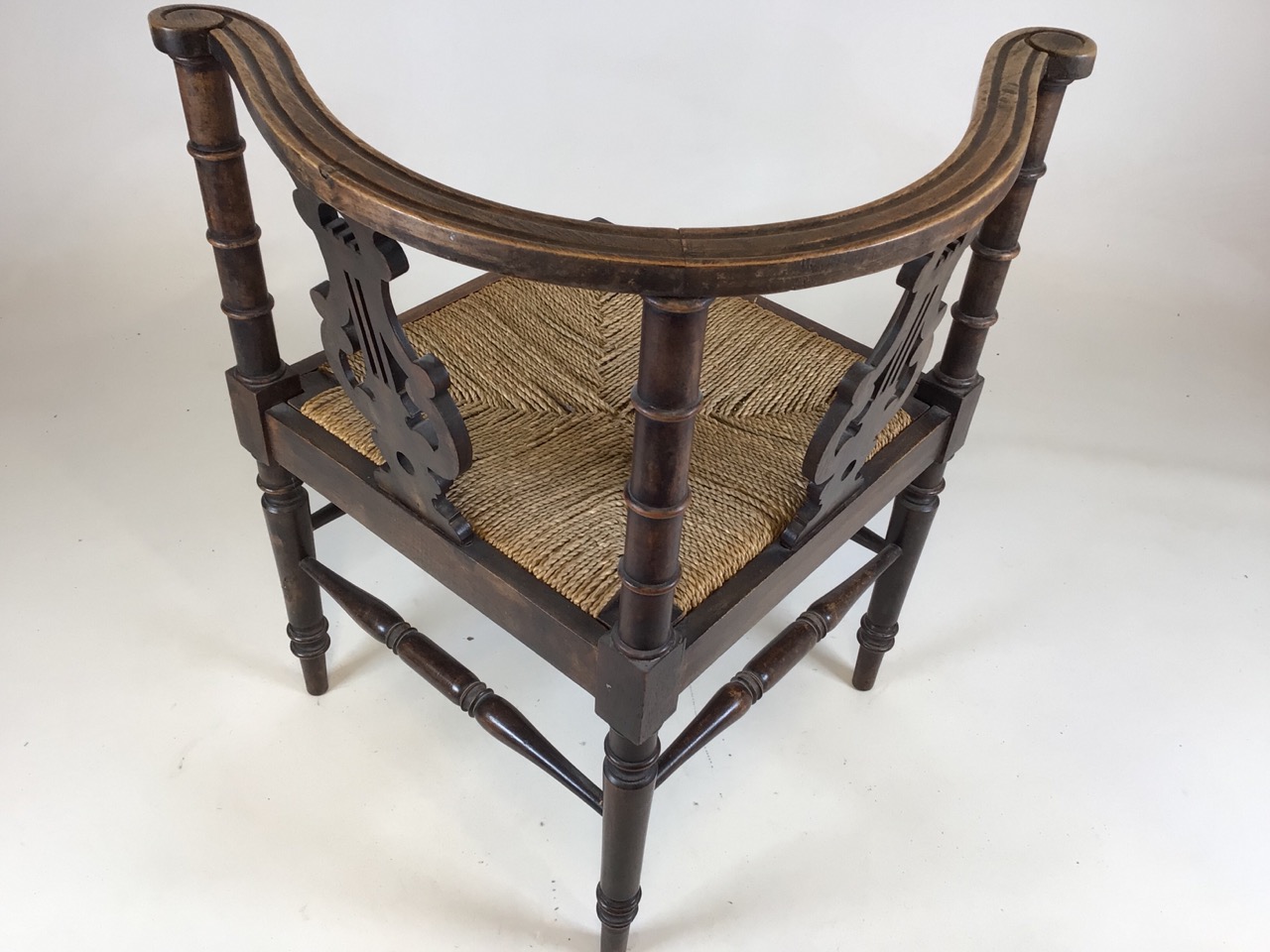 A 19th century rattan seated corner chair with curved back and lyre supports. W:61cm x D:61cm x H: - Image 4 of 6