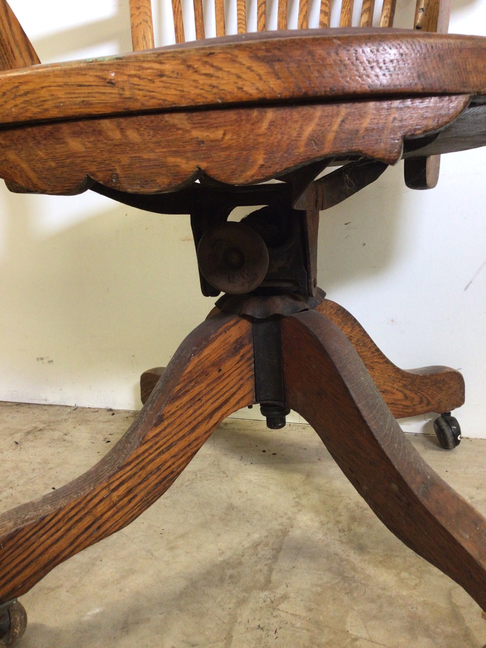 An early 20th century oak captains chair with tilt and swivel action, metal mechanics to base. - Image 2 of 11