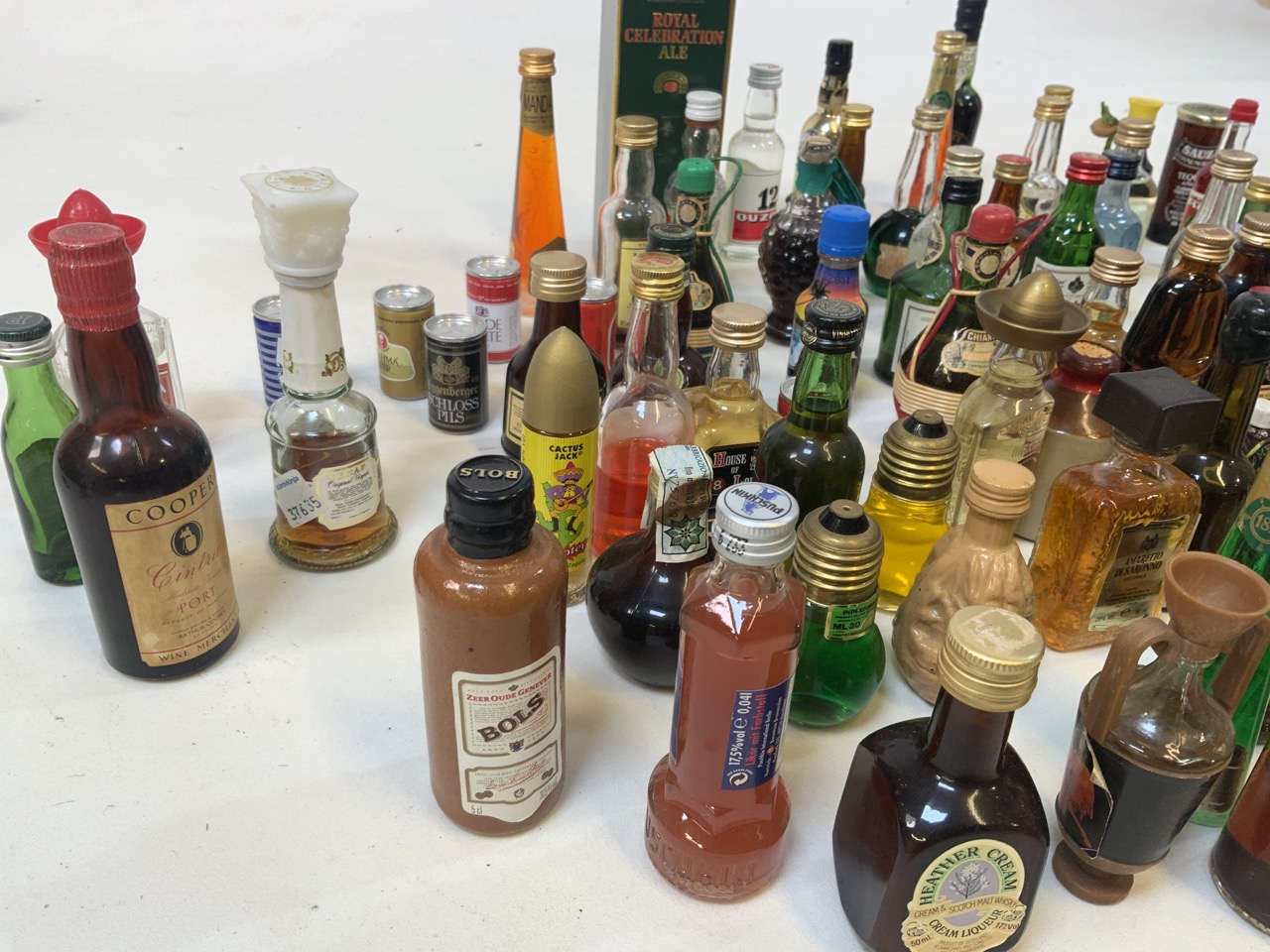 A large collection of miniatures including rum, port, whisky and tequila. A few empties for - Image 3 of 4