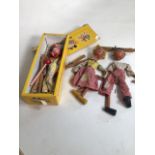 Three vintage Pelham puppets to include the clown and Hansel and Gretel from 1940s. Hansel and