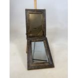 A pair of wooden mirrors with beaten metal decorative trim W:32cm x D:2cm x H:46cm