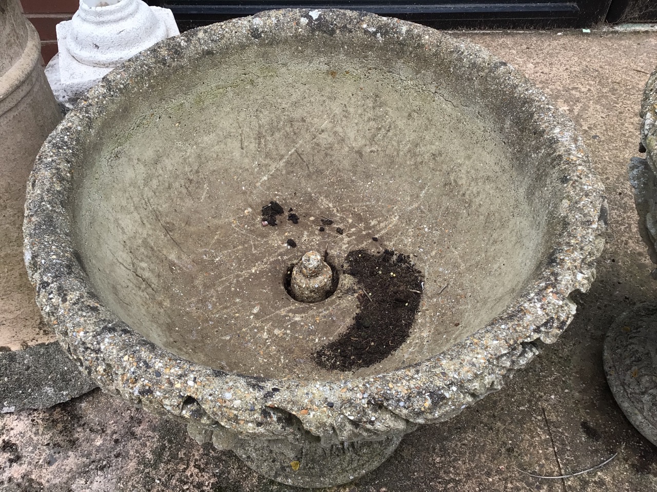A pair of decorative circular reconstituted stone planters on separate plinths. W:53cm x D:53cm x - Image 3 of 5