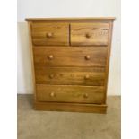 A modern quality solid wood chest of drawers with three long drawers beneath two short. W:96cm x D: