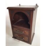 A small mahogany wall cabinet with two drawers and an open shelf. W:24cm x D:20cm x H:35cm