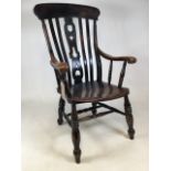 A19th century Swansea style ash and elm seated arm chair with pierced splat back. W:60cm x D:57cm