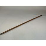 A satinwood gentlemans three piece walking stick. Unscrews to a fountain and a pencil. Top