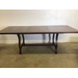A mid century extendable dining table by Younger. W:218cm x D:91cm x H:75cm W:157cm x D:91cm x H: